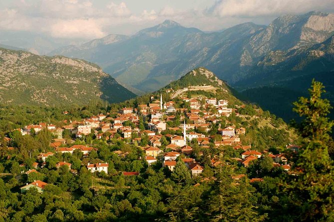 Altinbesik Cave Tour Ormana and Villages - Ormana First Stop: Button Houses, Vineyards, and Goat-Led Views