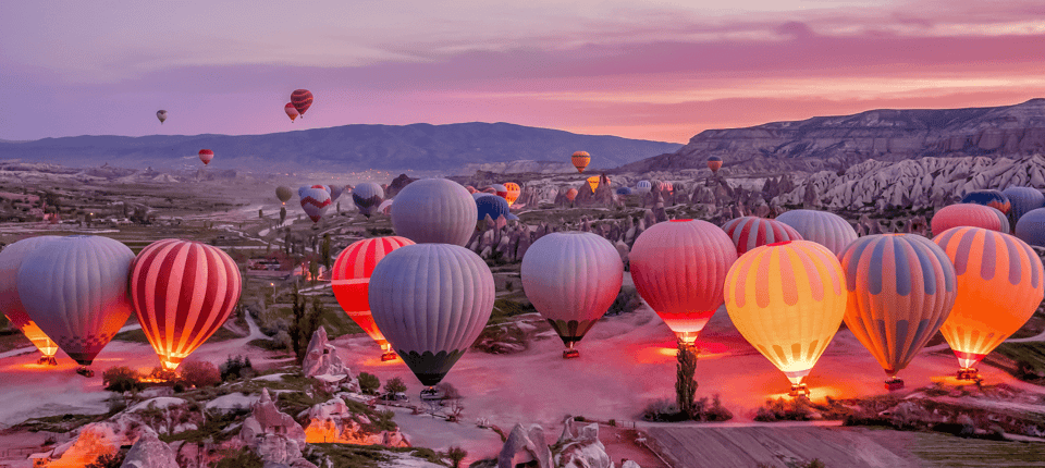 Antalya: 2-Day Guided Cappadocia Tour with Cave Hotel Option - Day 2: balloon option, Uchisar panoramas, Pigeon Valley stops, and the caravanserai finale