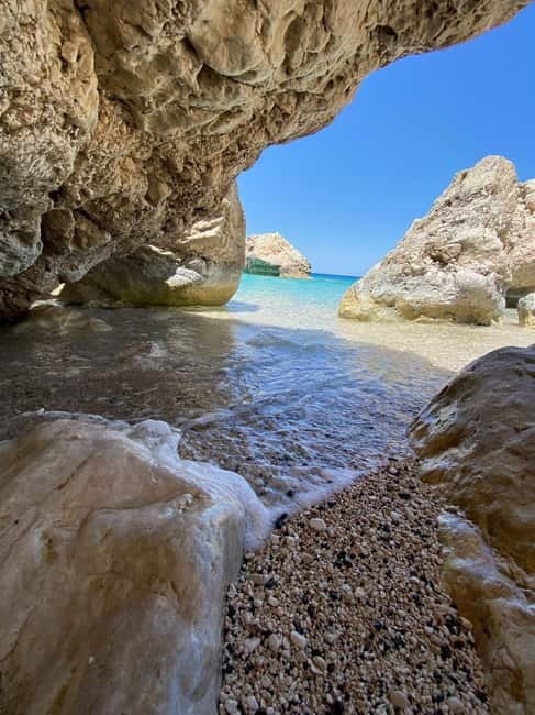 Antalya/Kemer: Suluada Boat Tour with Bays & Maldives Beach - Waterfall Bay and lunch: eating while the scenery does the work