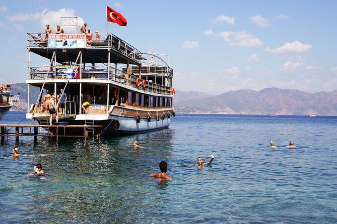 Dolphin Island Boat Trip – Swim, Sun & Lunch Included - Foam Party, Music Volume, and Family Energy