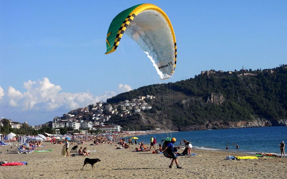 From Antalya, Belek, Side Alanya Paragliding Experience - How the day runs: pickup, briefing, mountain launch, and beach landing