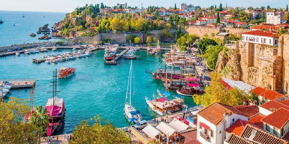 From city of Side: Antalya Old City and Waterfall Day Trip - Hadrian’s Gate and Kaleiçi: your 4 hours of real freedom