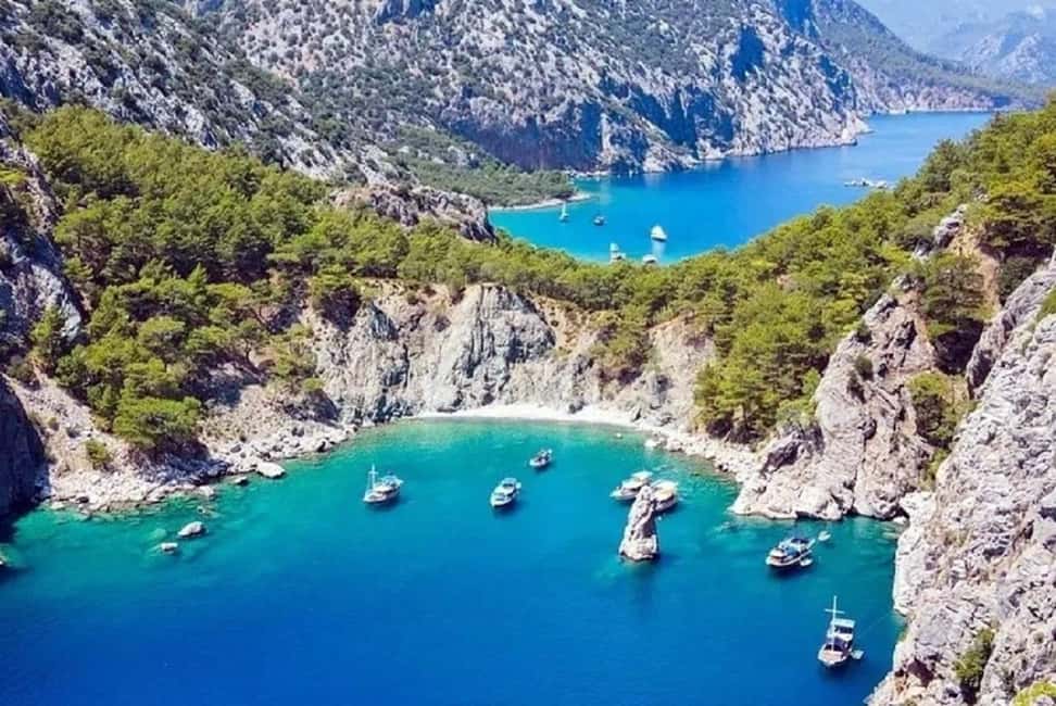 Kemer Porto Genoese-Sazak Bays Boat Trip With Mud Baths - Sazak Bay: Clear Water, Sea Caves, and Snorkel-Optional Breaks